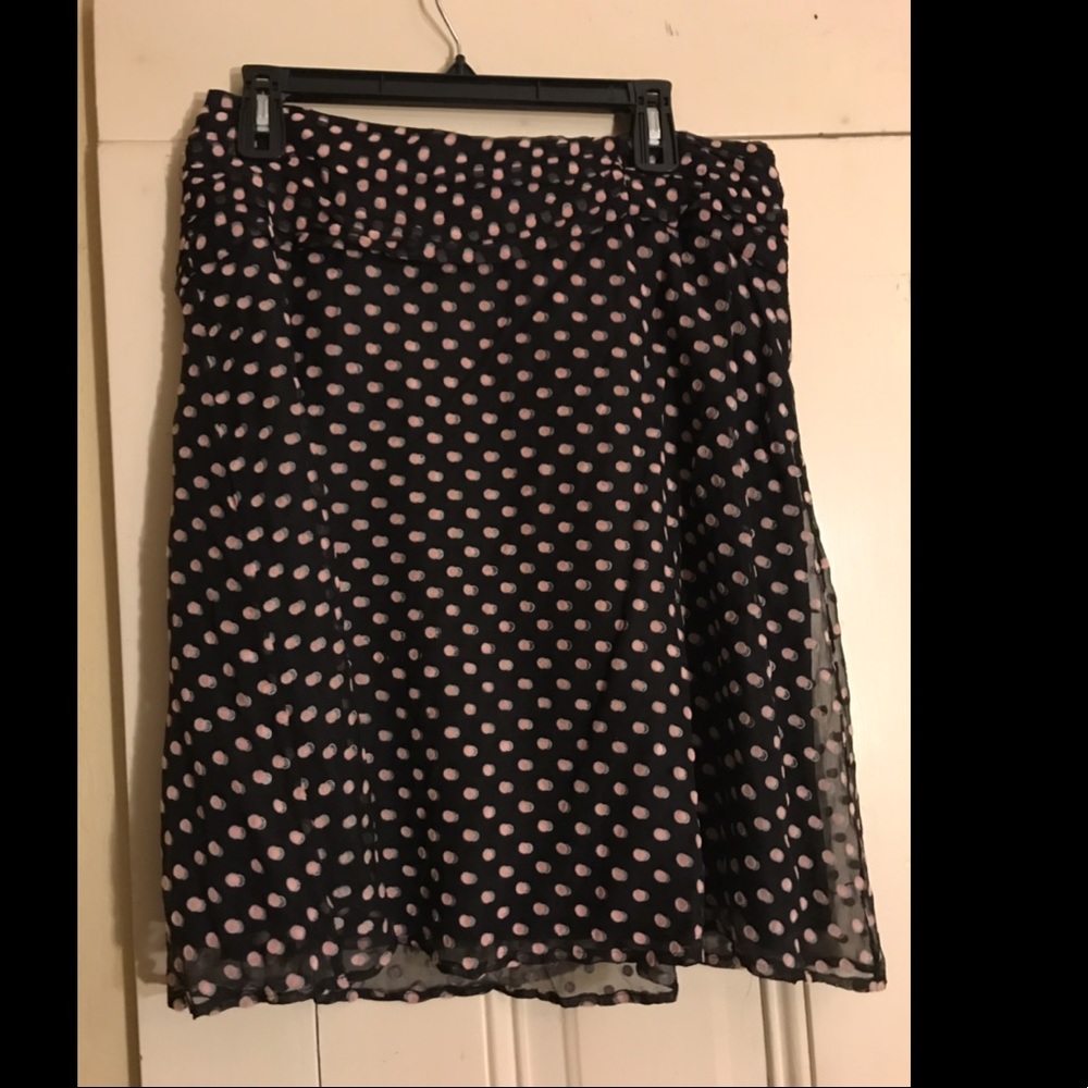 Black skirt with pink polka dots